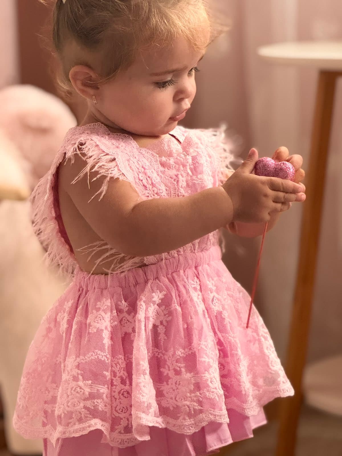 Baby Feather Jumpsuit Dress from Gia's Party Rental